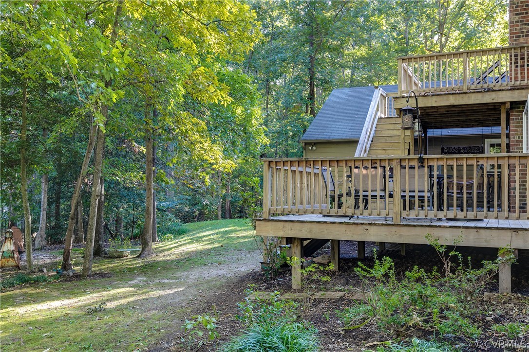 13507 Queensgate Road Midlothian, VA 23114 - Photo 39 of 45 a view of backyard with deck and outdoor seating