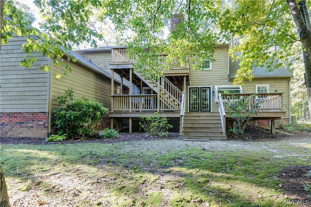 13507 Queensgate Road Midlothian, VA 23114 - Photo 44 of 45 a view of a house with a yard