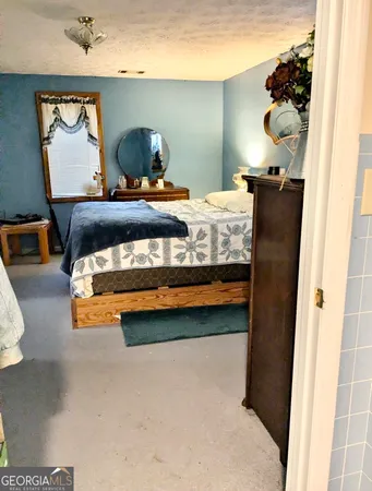 a bathroom with a tub and shower