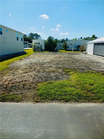 a view of a patio with a yard
