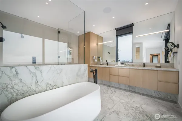 a bathroom with a toilet sink and tub