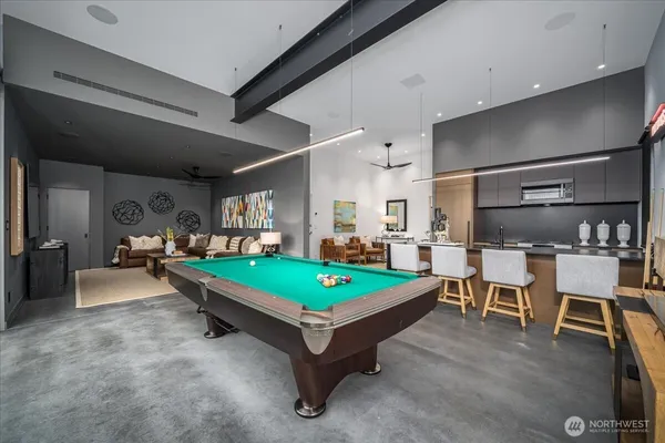 a living room with furniture fireplace and a flat screen tv