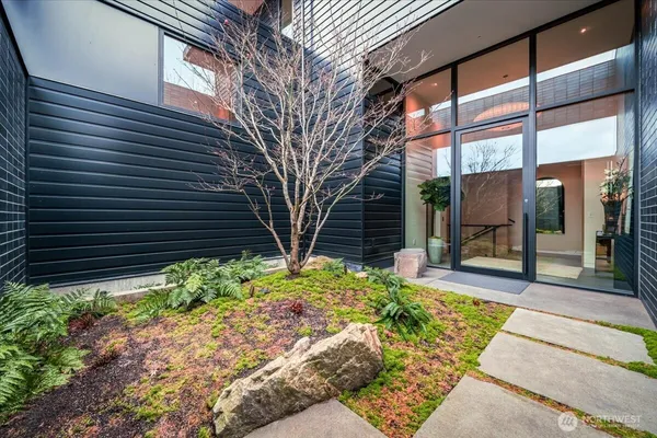an aerial view of houses with yard