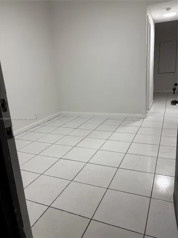 a view of a room and white wall