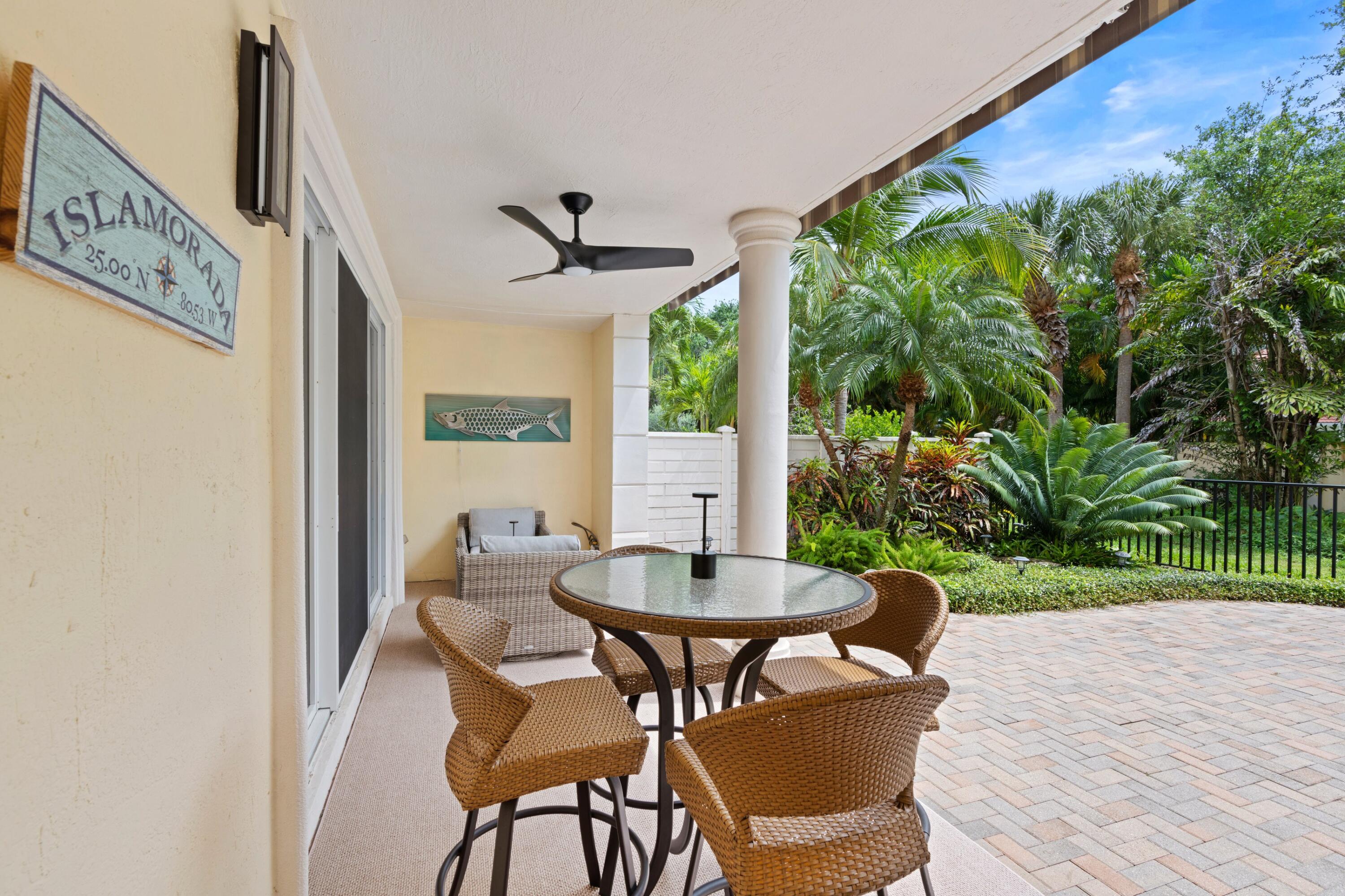 648 Northeast Francesca Lane Boca Raton, FL 33487 - Photo 33 of 40 a dining room with furniture and garden view