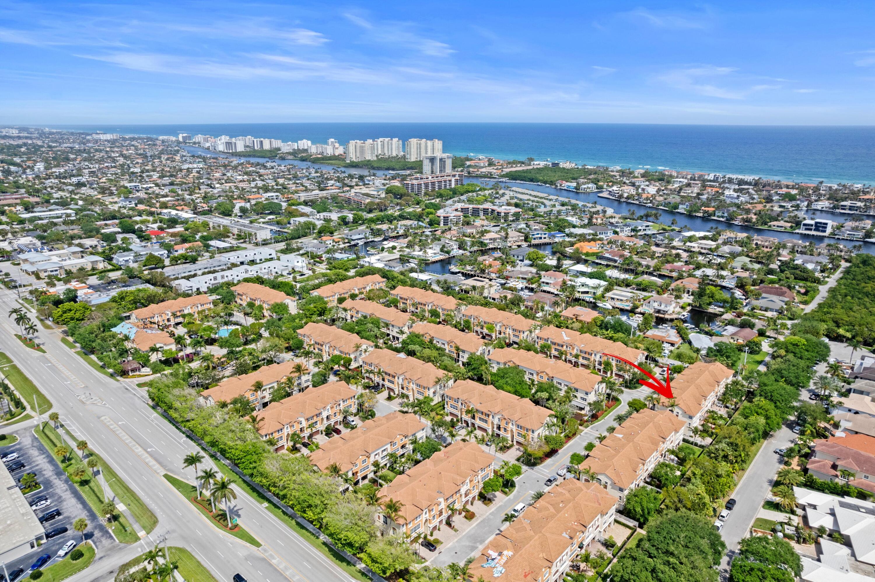 648 Northeast Francesca Lane Boca Raton, FL 33487 - Photo 38 of 40 an aerial view of residential building with trees