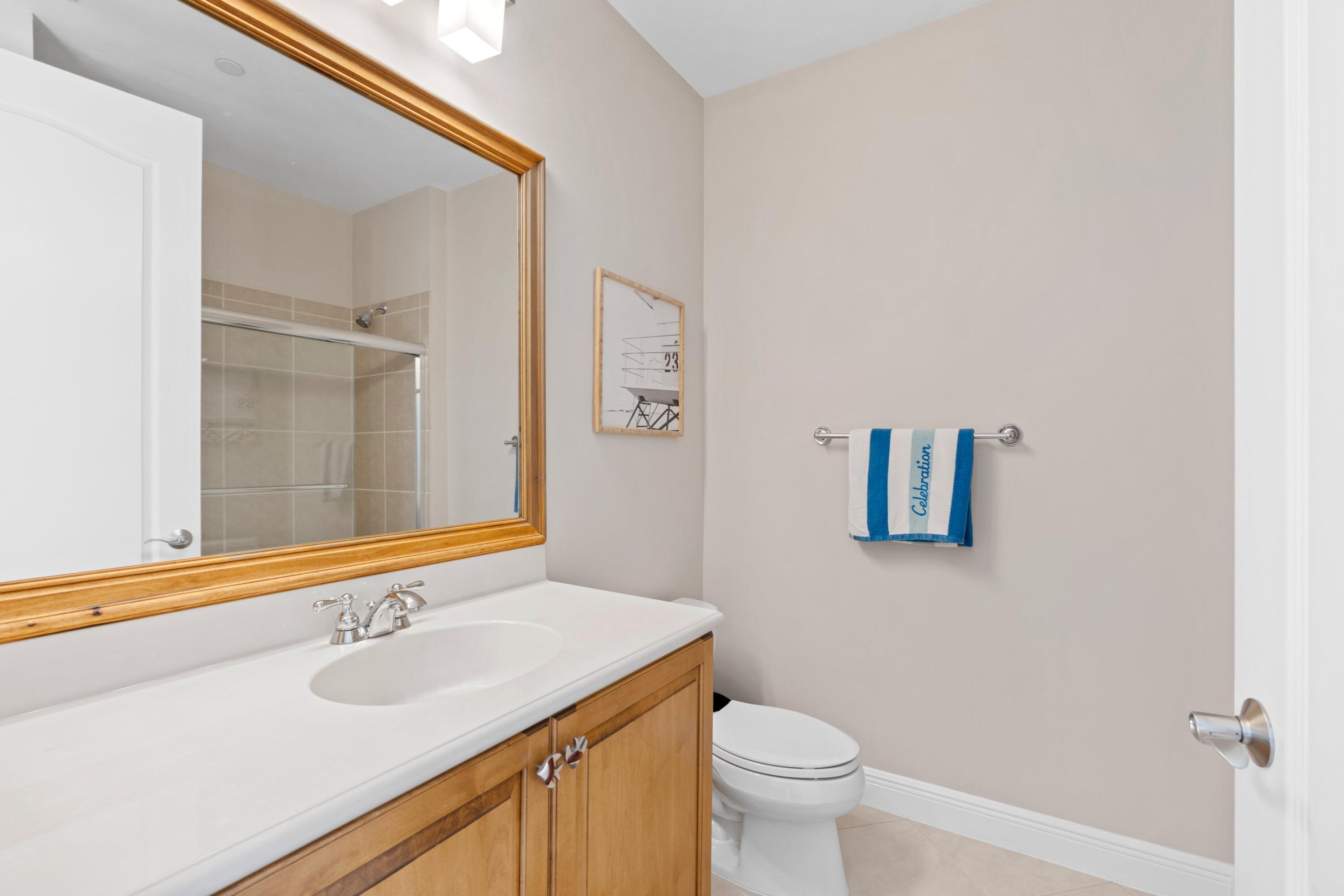 648 Northeast Francesca Lane Boca Raton, FL 33487 - Photo 4 of 40 a bathroom with a sink and a mirror