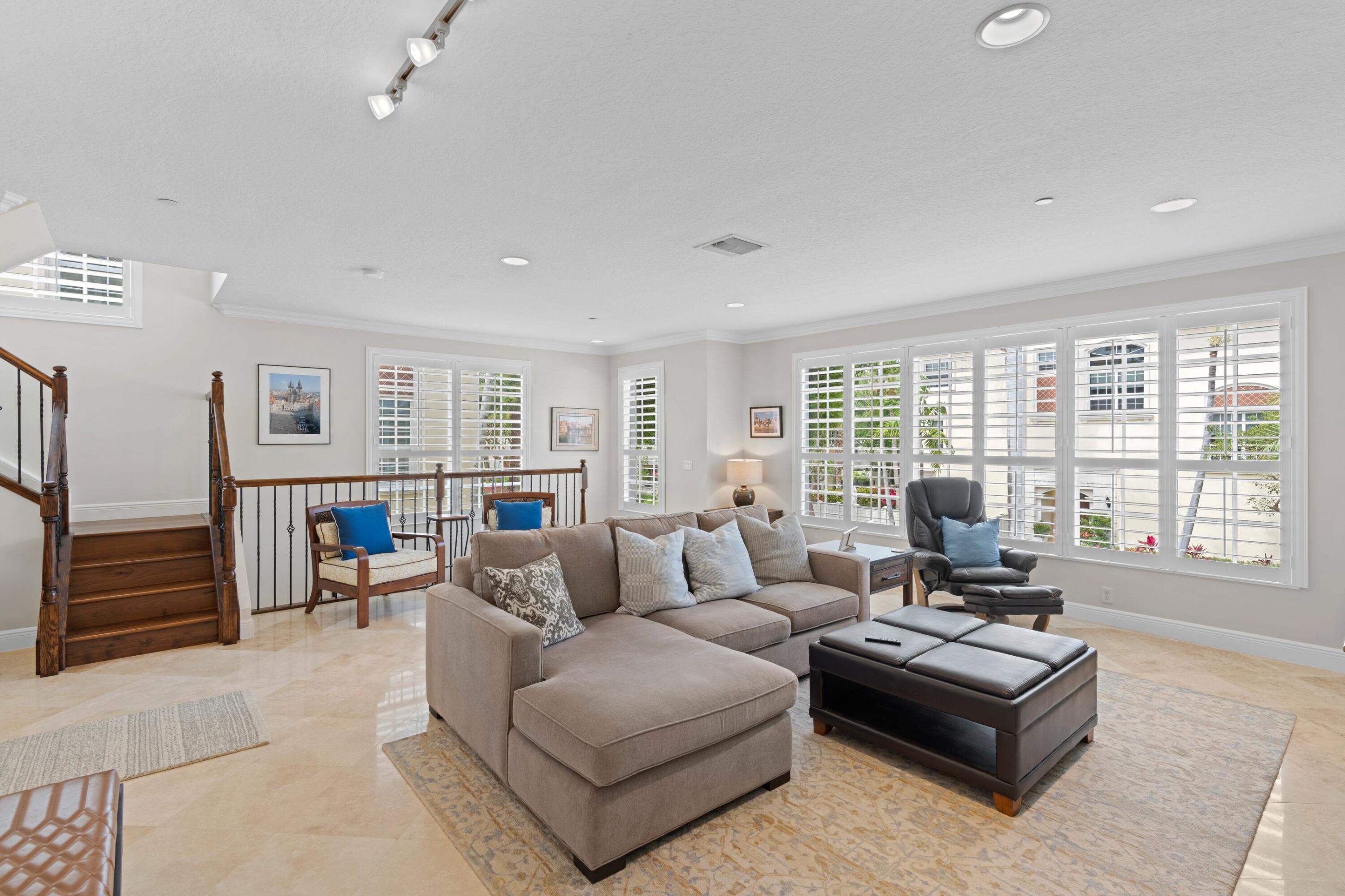 648 Northeast Francesca Lane Boca Raton, FL 33487 - Photo 6 of 40 a living room with furniture and a large window