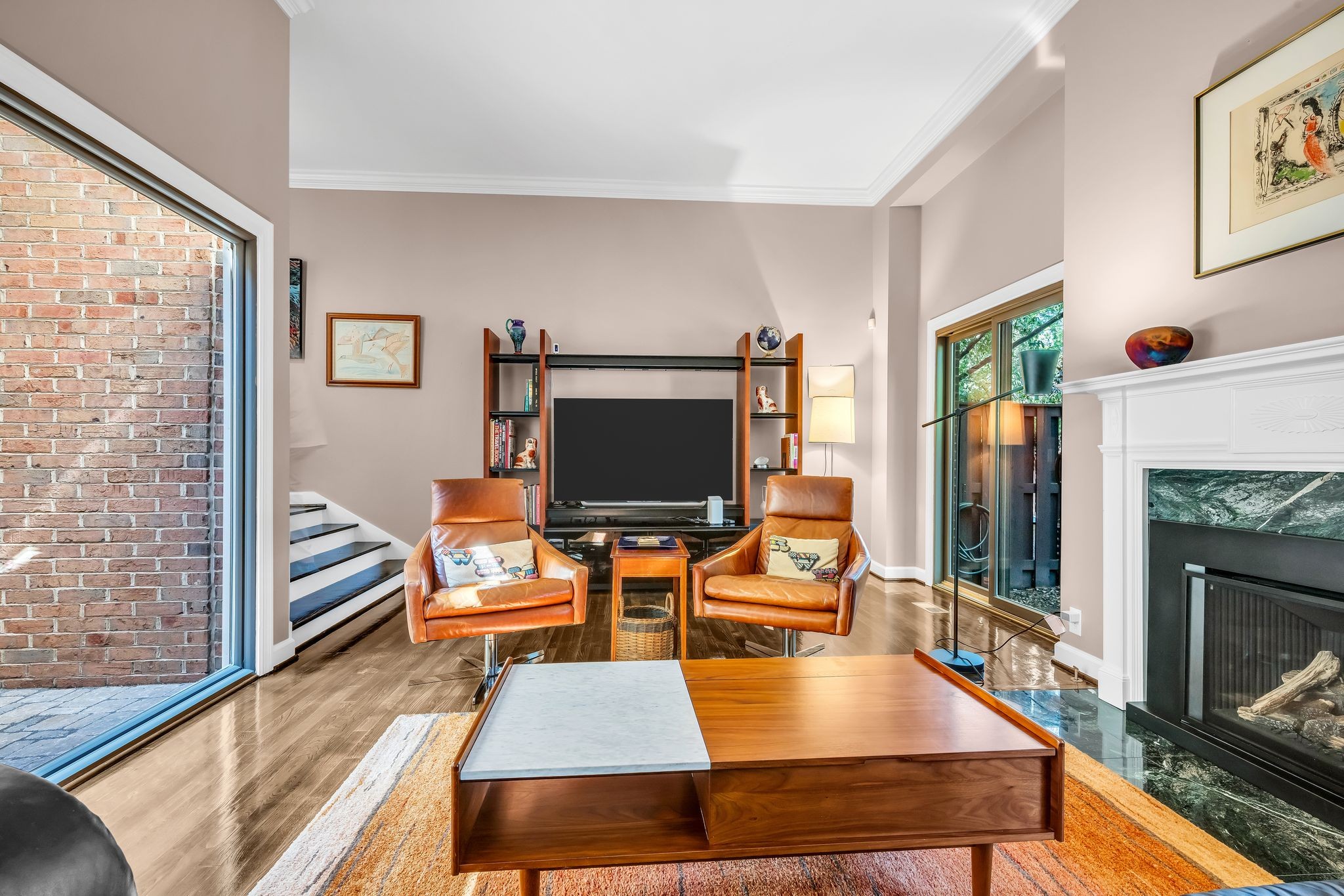 694 Timber Lane Nashville, TN 37215 - Photo 15 of 30 a living room with furniture flat screen tv and a fireplace