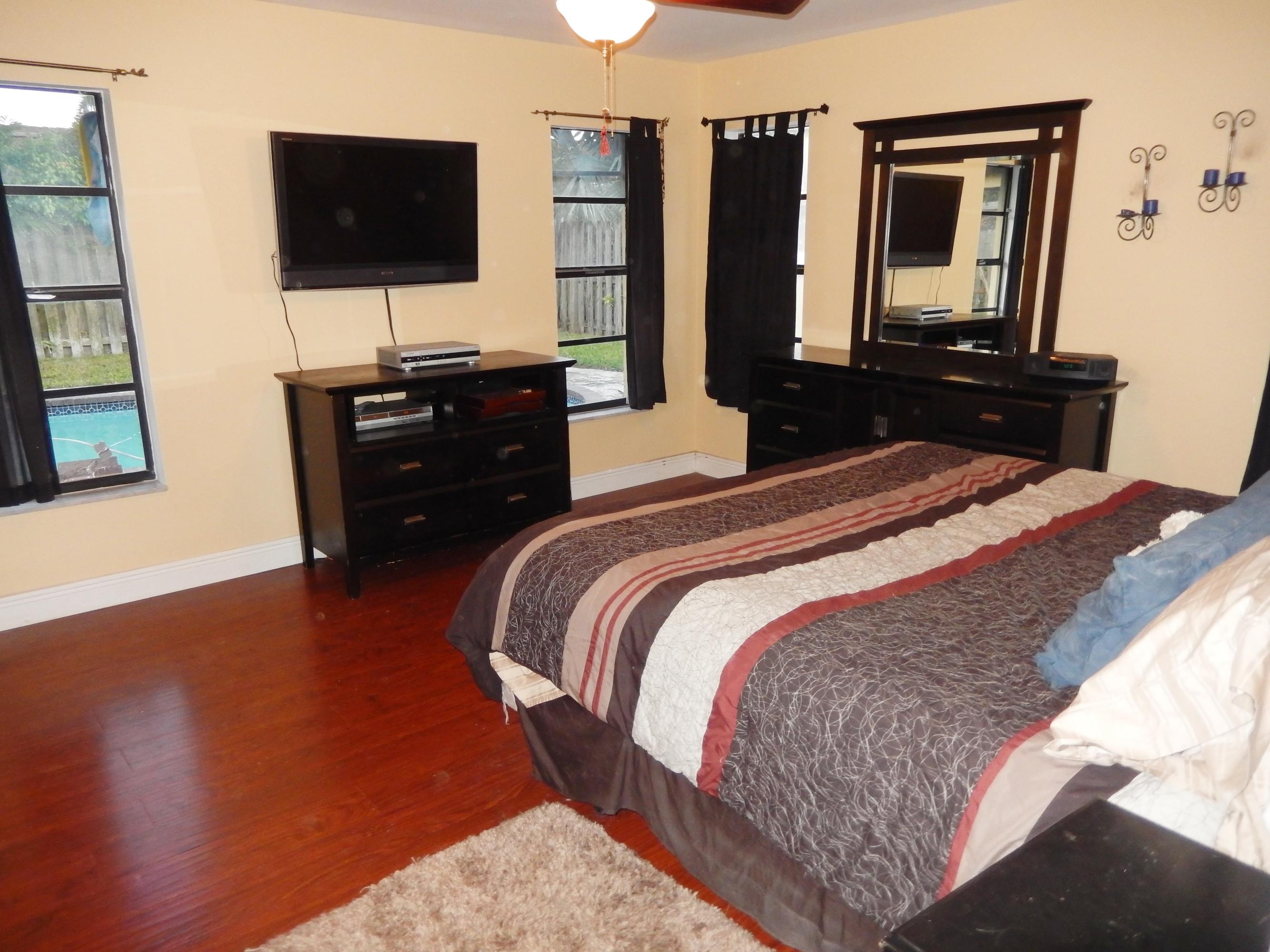 11370 Chipmunk Drive Boca Raton, FL 33428 - Photo 16 of 20 Master bedroom