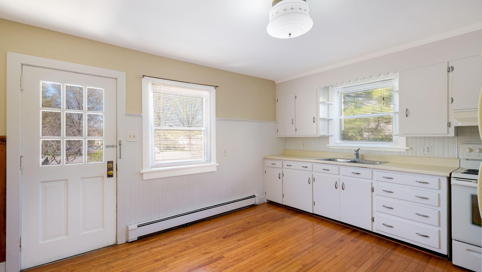 3617 Ferry Road Fountainville, PA 18923 - Photo 3 of 10 Sunny Kitchen with hardwoods and lots of cabinets!