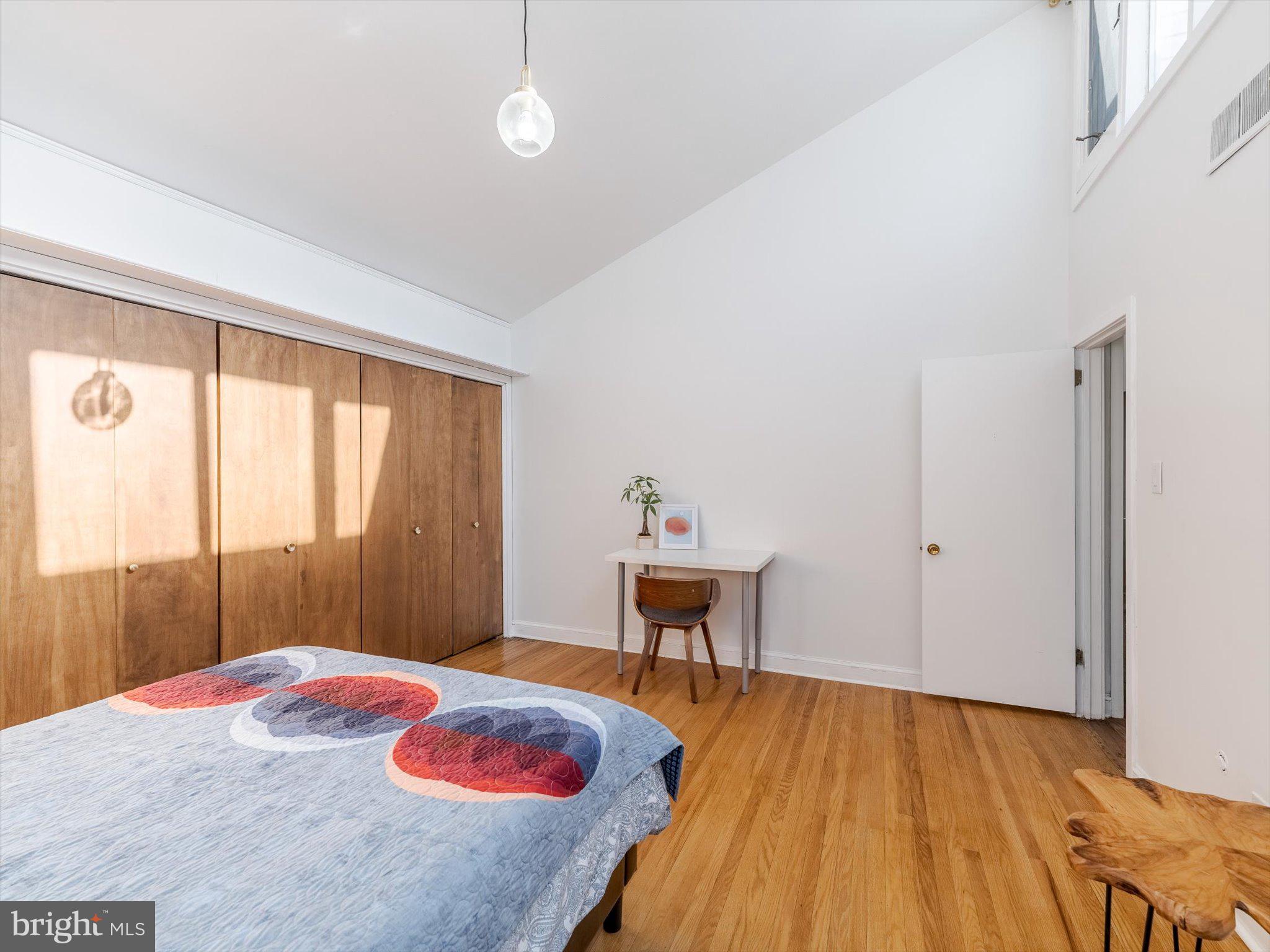 919 Laburnum Lane Wyncote, PA 19095 - Photo 14 of 43 a bedroom with a bed and a table