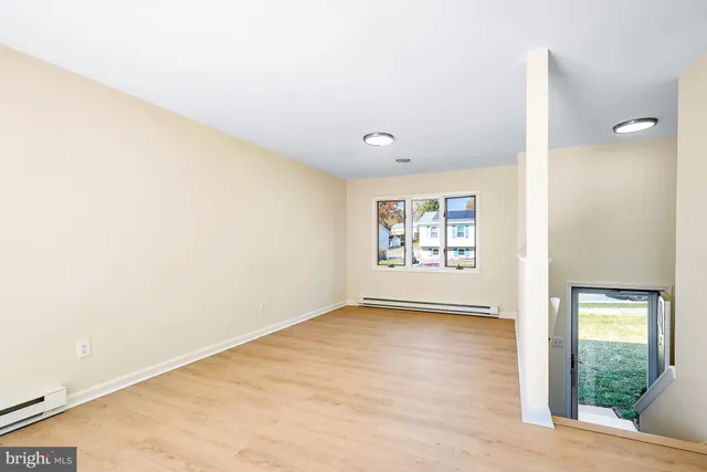 a view of a livingroom with furniture and windows