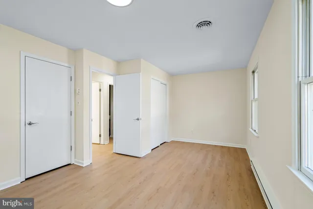 an empty room with windows