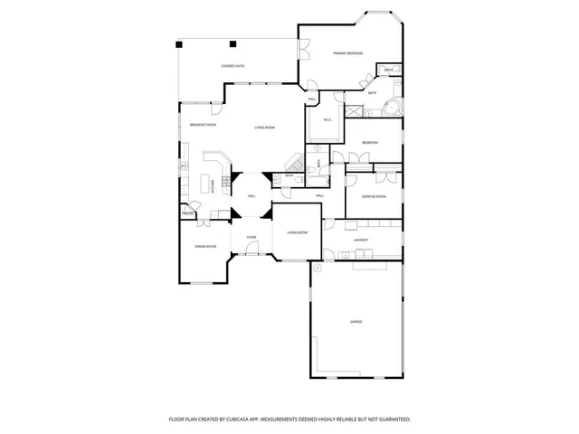 a view of a big house in a big yard with large trees