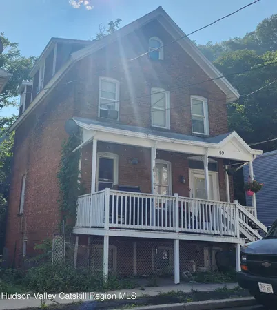 a view of a house with a deck