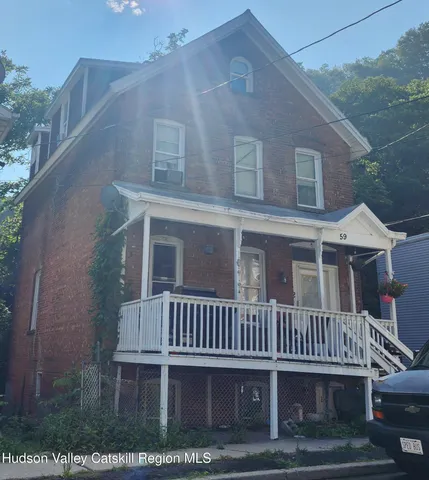 a view of a house with a deck