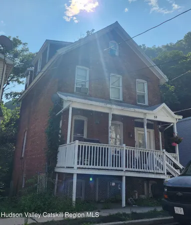 a view of a house with a deck