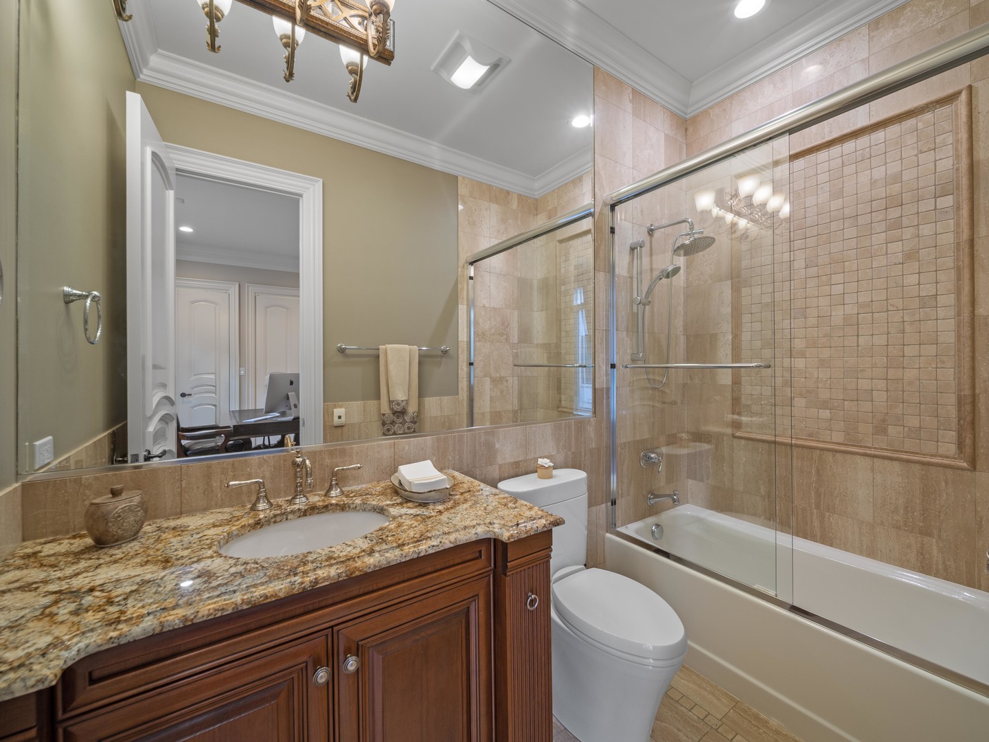 700 Greenwood Road Northbrook, IL 60062 - Photo 47 of 81 a bathroom with a granite countertop sink toilet and shower
