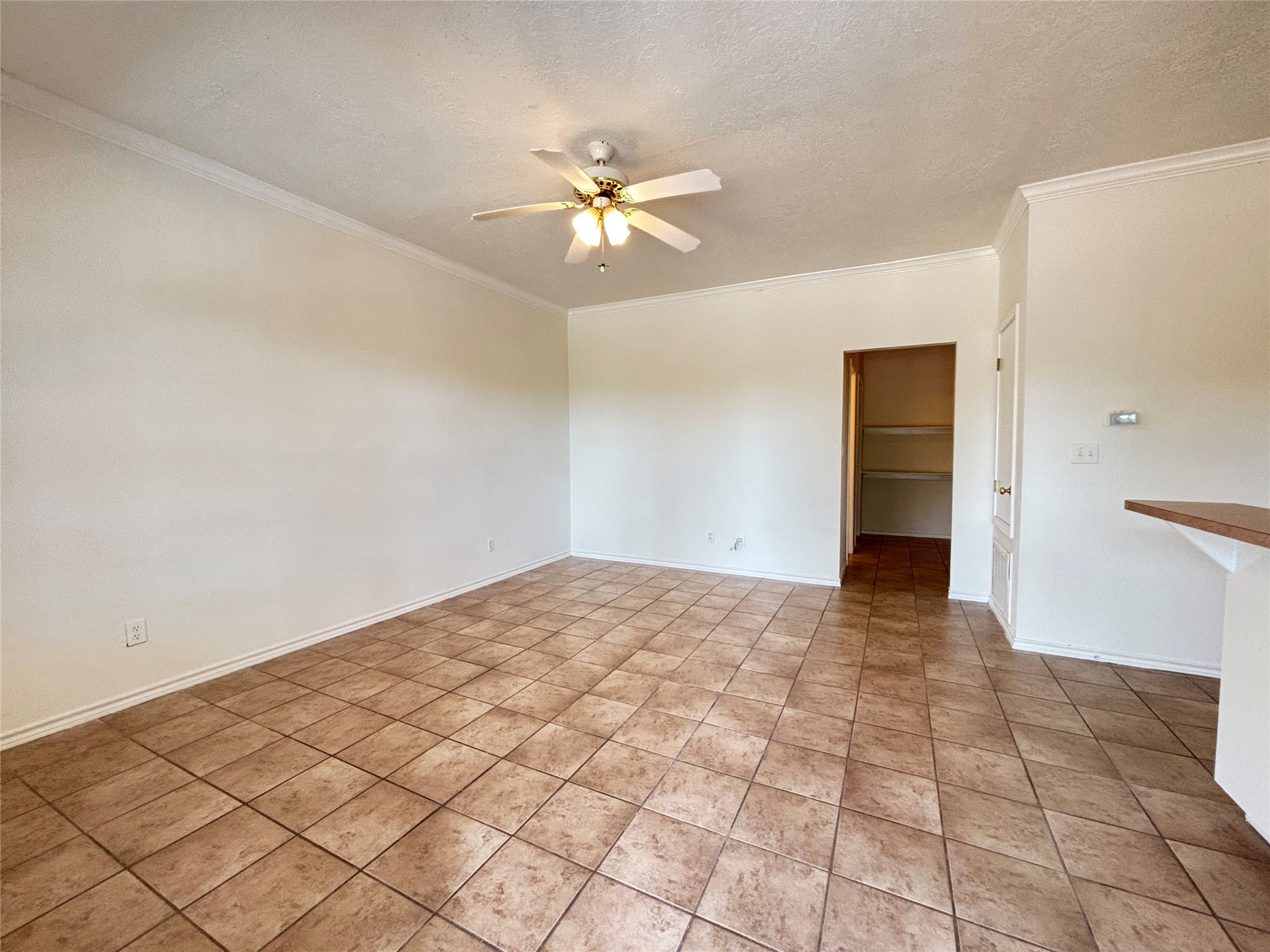 2455 Montgomery Road Huntsville, TX 77340 - Photo 2 of 10 a view of empty room with wooden floor