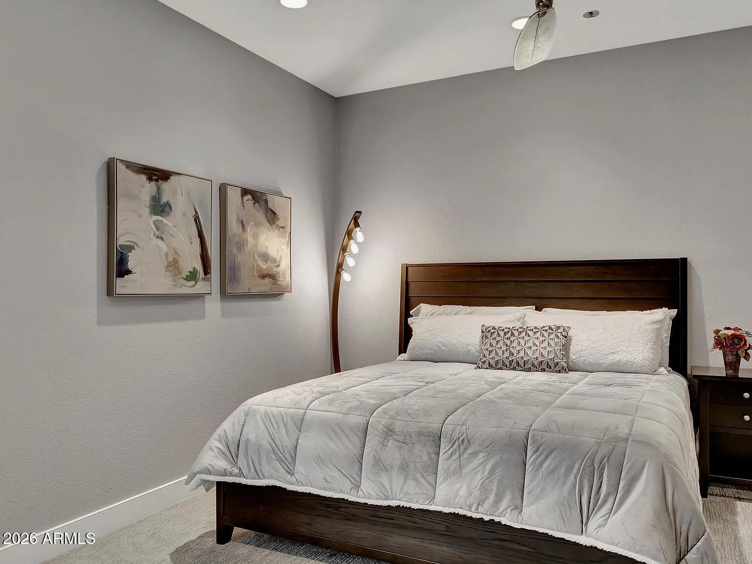 7773 East Stallion Road Scottsdale, AZ 85258 - Photo 15 of 33 a bedroom with a bed and painting on the wall