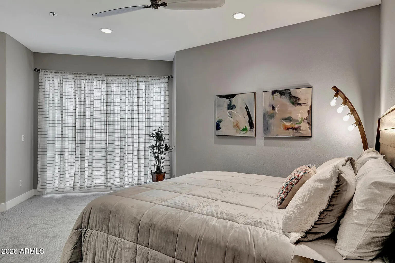7773 East Stallion Road Scottsdale, AZ 85258 - Photo 21 of 33 a bedroom with a large bed and a window