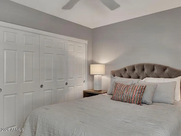 7773 East Stallion Road Scottsdale, AZ 85258 - Photo 23 of 33 a bedroom with a bed and a window