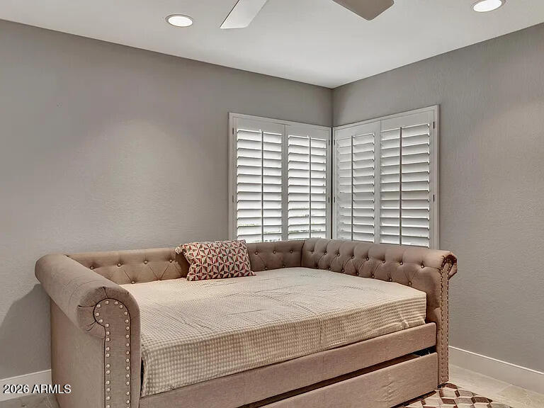 7773 East Stallion Road Scottsdale, AZ 85258 - Photo 24 of 33 a bedroom with a bed and window