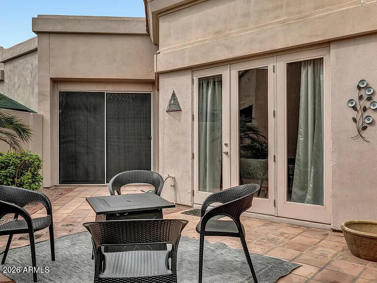 7773 East Stallion Road Scottsdale, AZ 85258 - Photo 26 of 33 a outdoor space with a couch and chairs