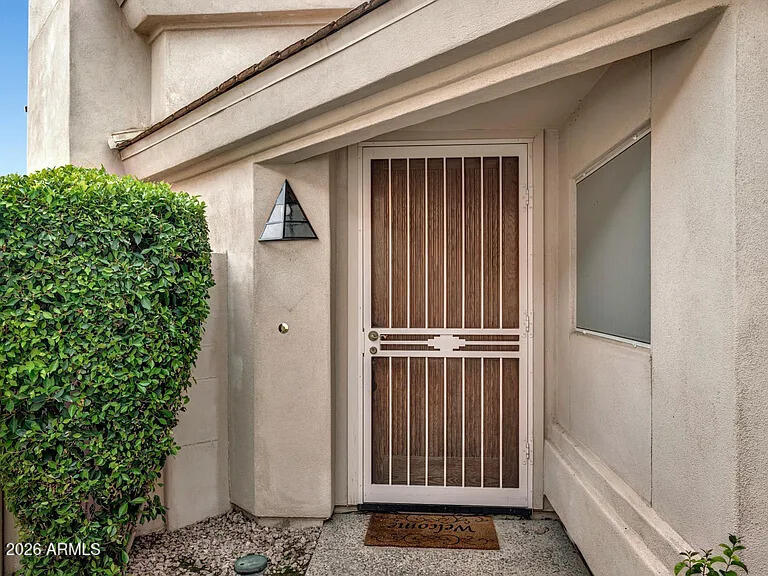 7773 East Stallion Road Scottsdale, AZ 85258 - Photo 3 of 33 a view of a door and a window