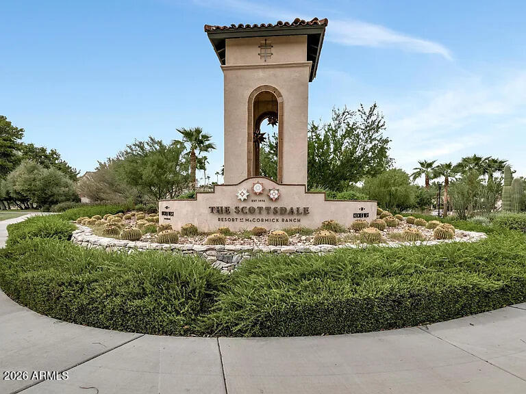 7773 East Stallion Road Scottsdale, AZ 85258 - Photo 31 of 33 a front view of a house with a yard