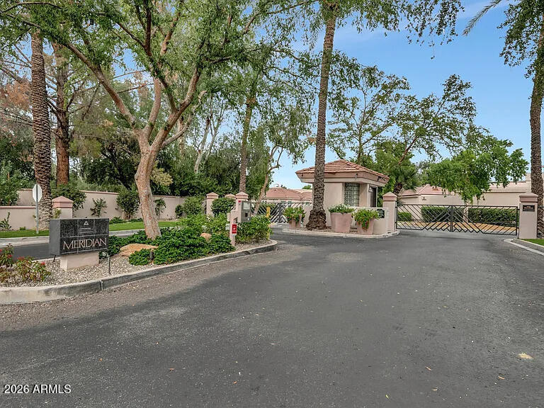 7773 East Stallion Road Scottsdale, AZ 85258 - Photo 32 of 33 a view of a street with a bench and trees