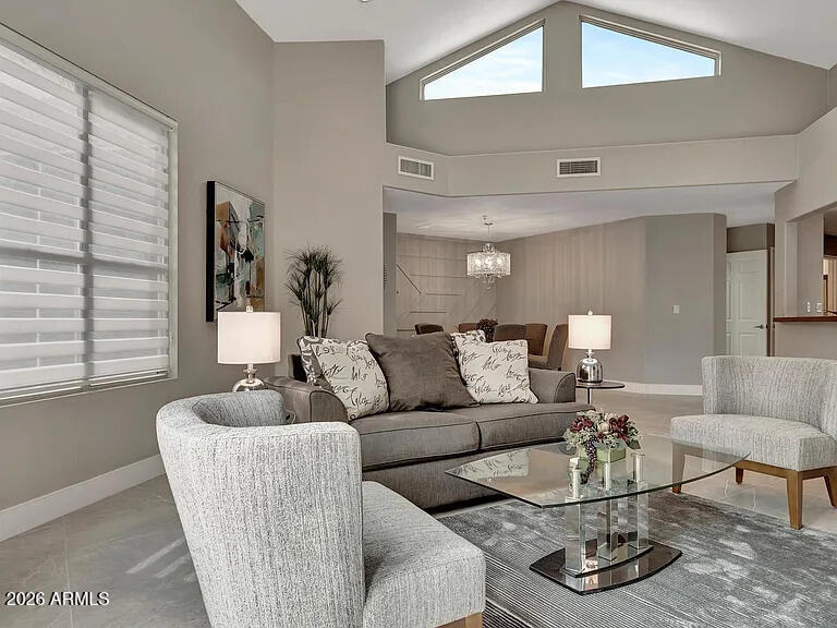 7773 East Stallion Road Scottsdale, AZ 85258 - Photo 4 of 33 a living room with furniture and a large window