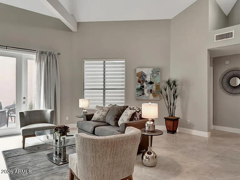 7773 East Stallion Road Scottsdale, AZ 85258 - Photo 6 of 33 a living room with furniture and a large window