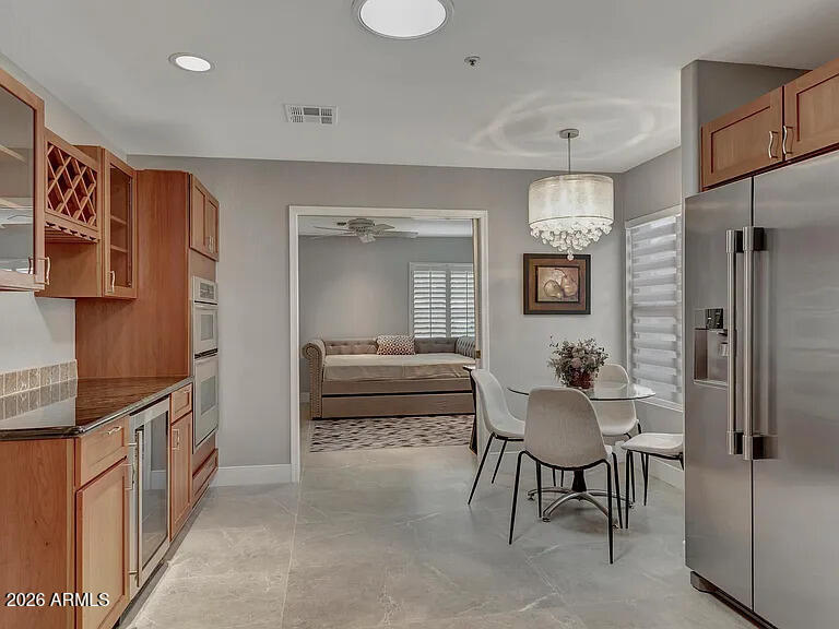 7773 East Stallion Road Scottsdale, AZ 85258 - Photo 9 of 33 a living room with furniture and a table