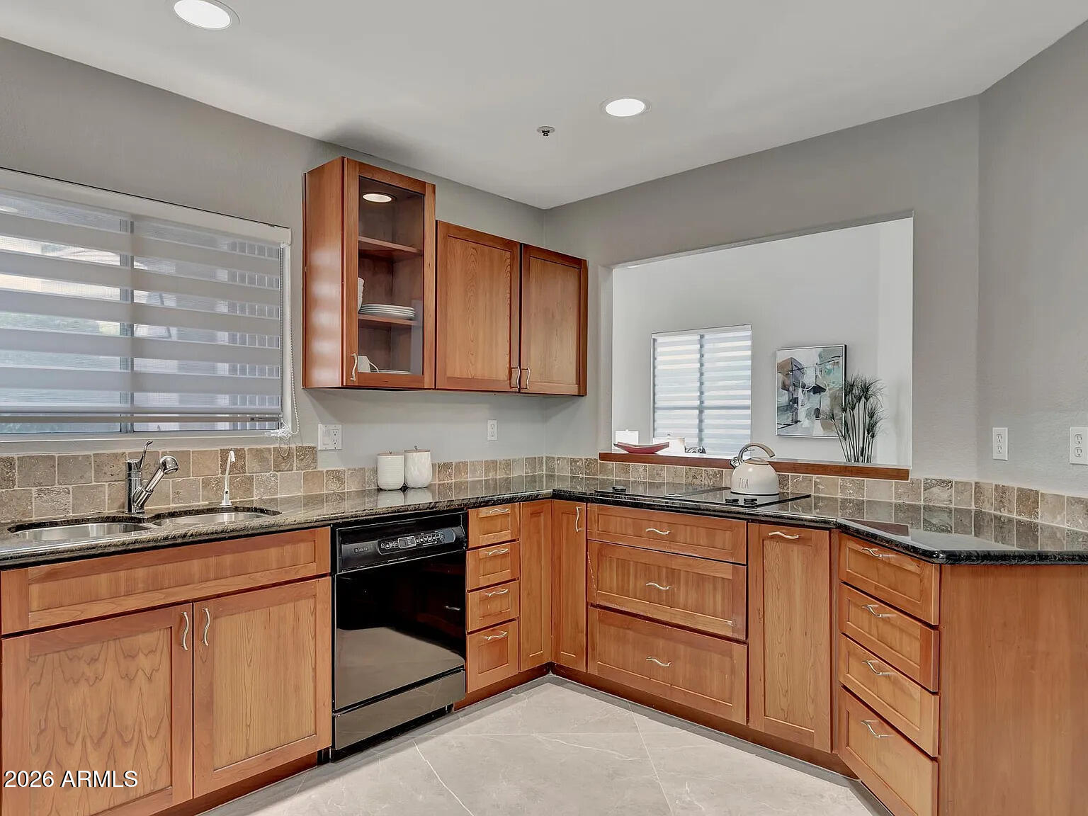 7773 East Stallion Road Scottsdale, AZ 85258 - Photo 10 of 33 a kitchen with granite countertop sink stainless steel appliances and cabinets