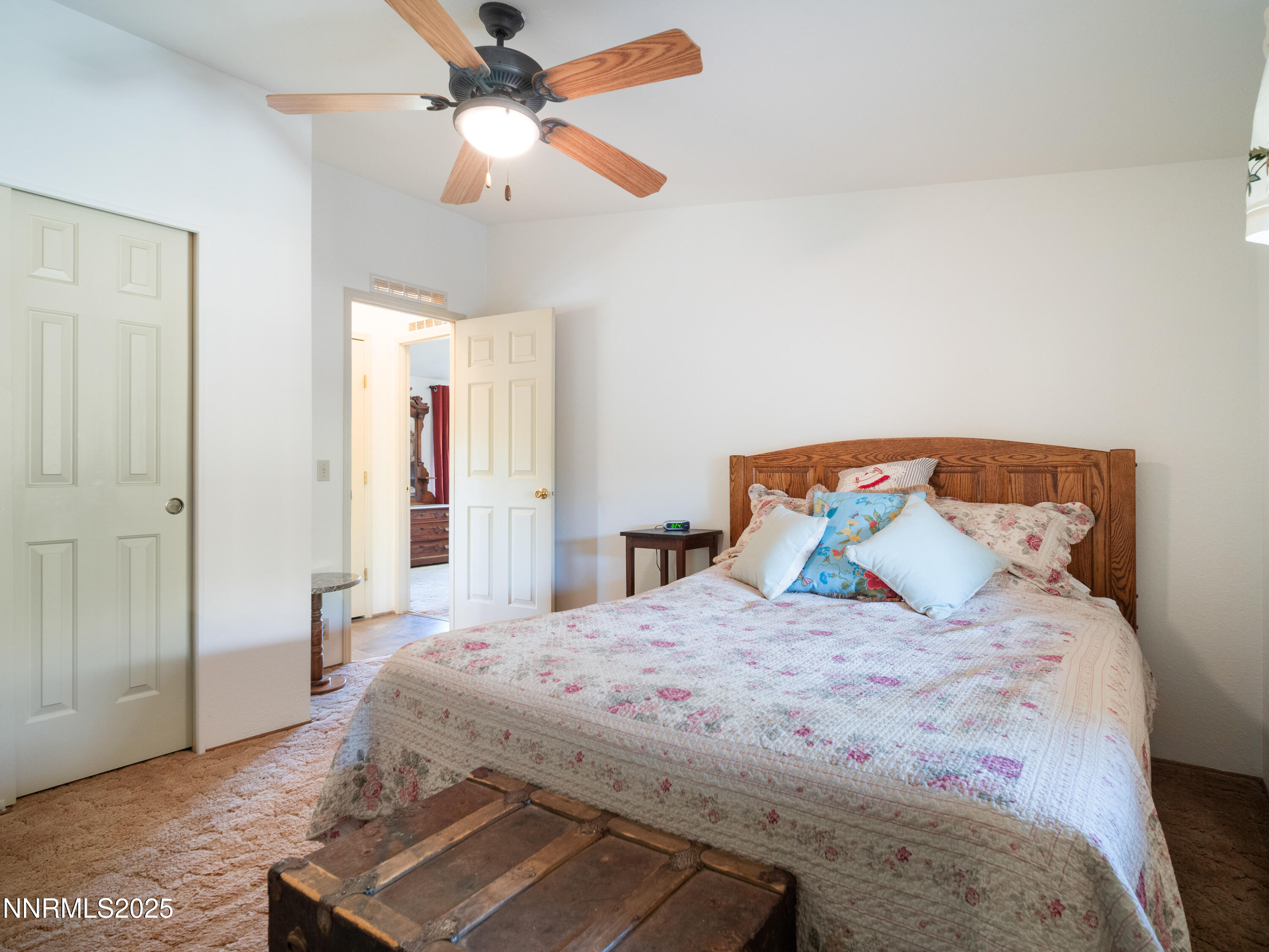 3670 Pine Nut Way Topaz Ranch Estates, NV 89444 - Photo 21 of 74 a bedroom with a bed and wooden floor