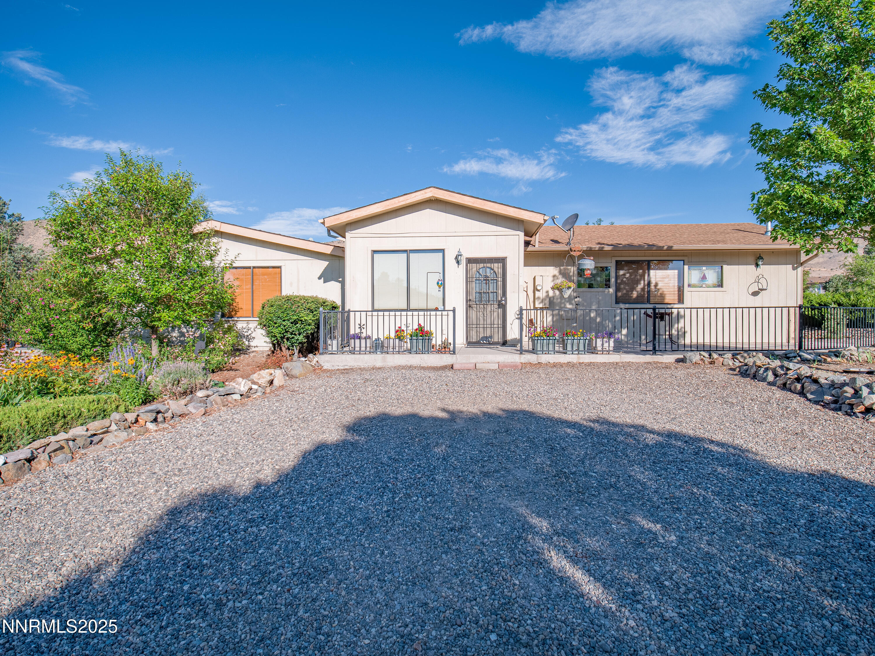 3670 Pine Nut Way Topaz Ranch Estates, NV 89444 - Photo 42 of 74 a view of a house with outdoor space and a yard