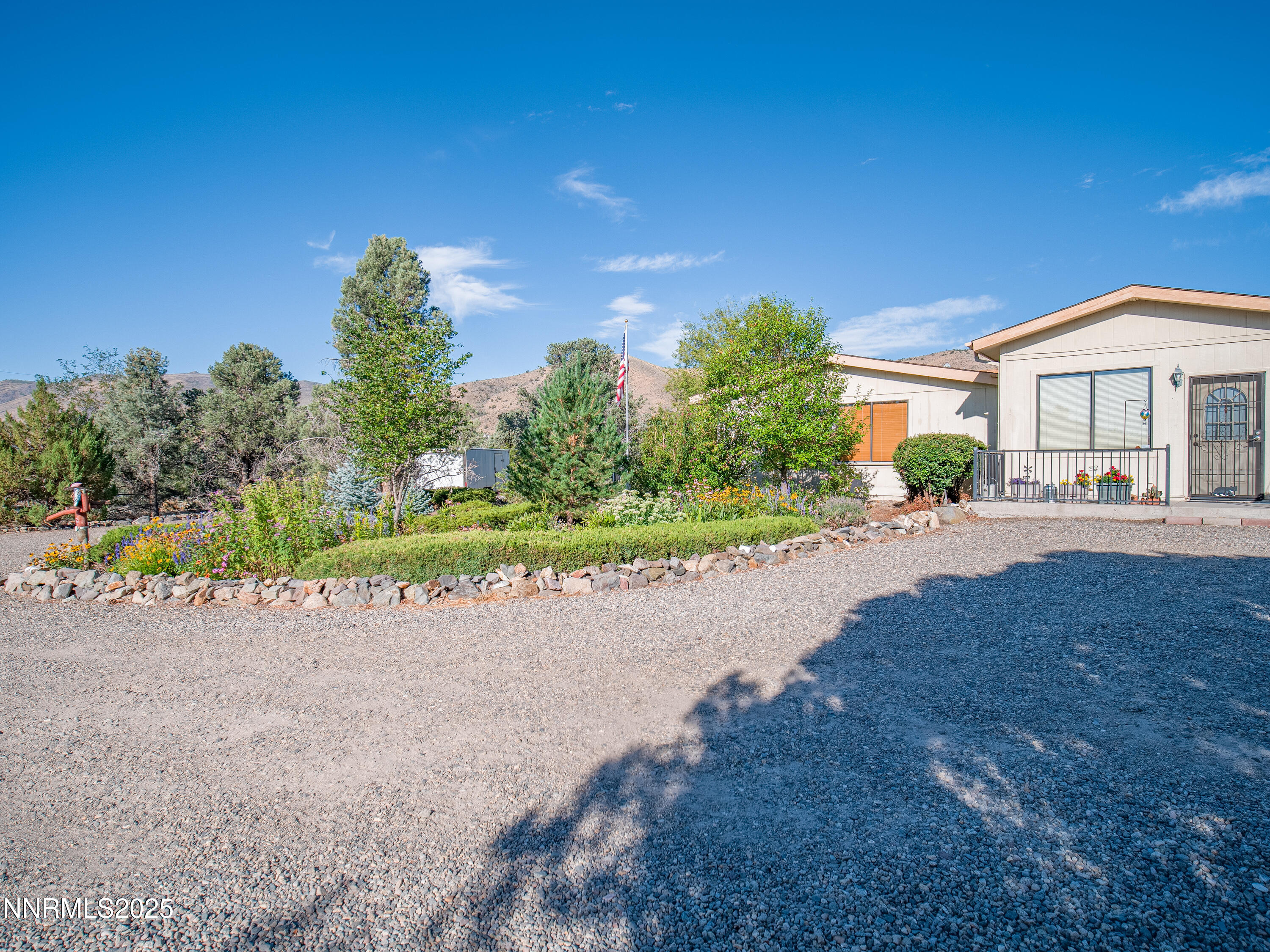 3670 Pine Nut Way Topaz Ranch Estates, NV 89444 - Photo 44 of 74 a view of house with outdoor space and street view