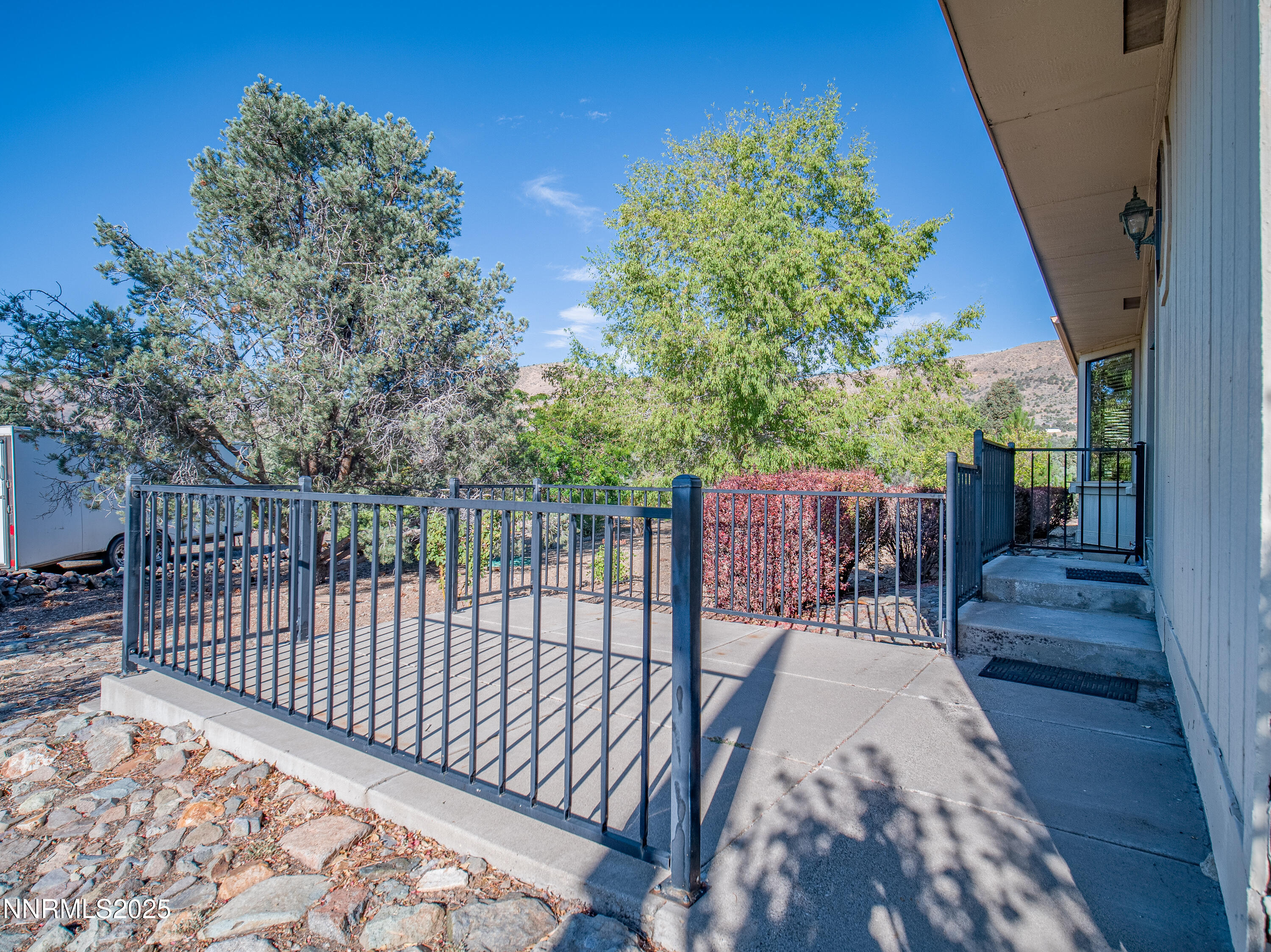 3670 Pine Nut Way Topaz Ranch Estates, NV 89444 - Photo 45 of 74 a view of balcony with wooden floor and outdoor seating