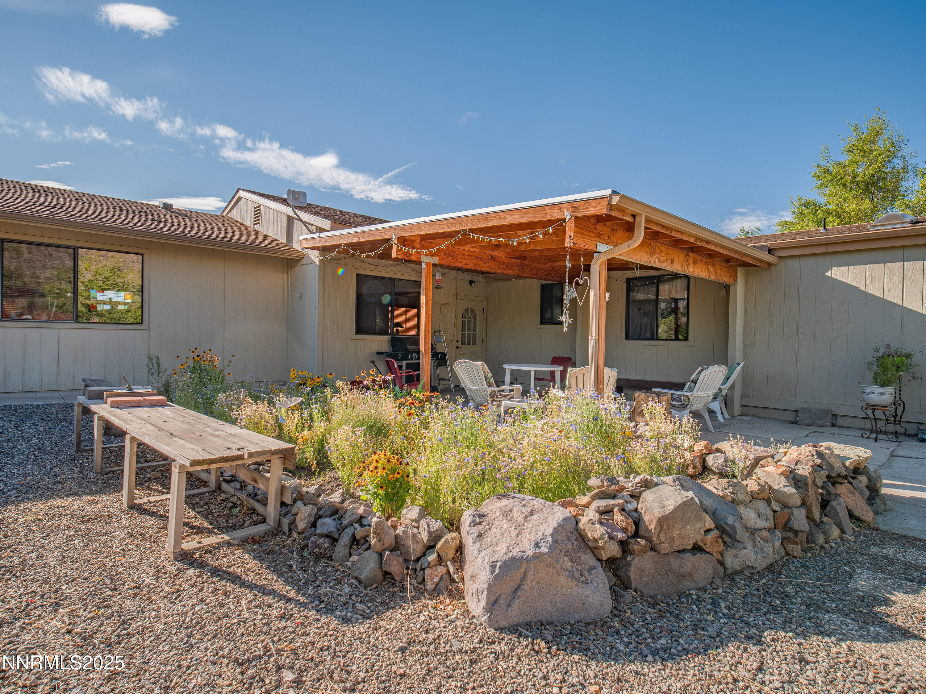 3670 Pine Nut Way Topaz Ranch Estates, NV 89444 - Photo 50 of 74 a view of backyard of house with seating space