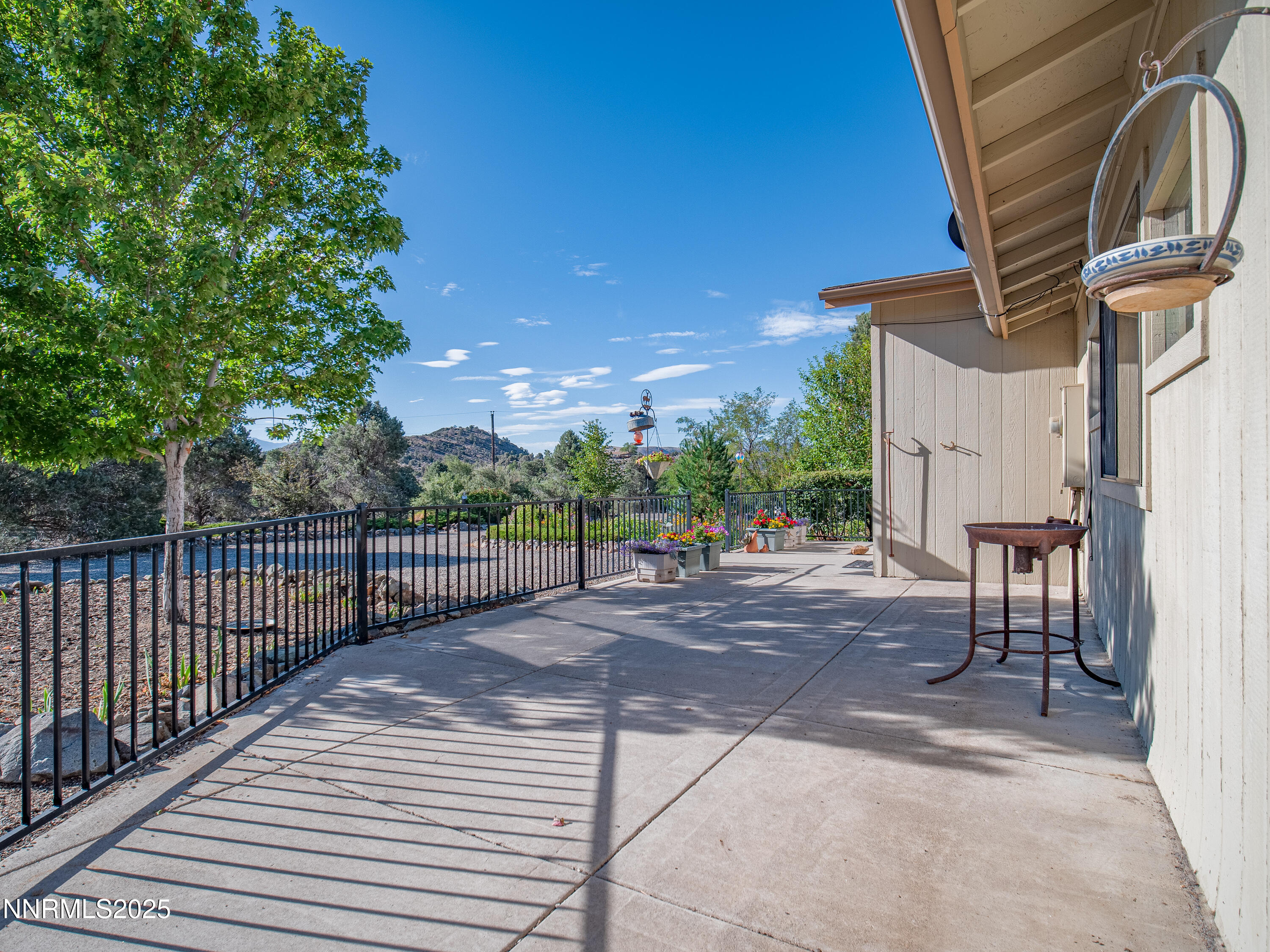 3670 Pine Nut Way Topaz Ranch Estates, NV 89444 - Photo 56 of 74 a view of a backyard with sitting area