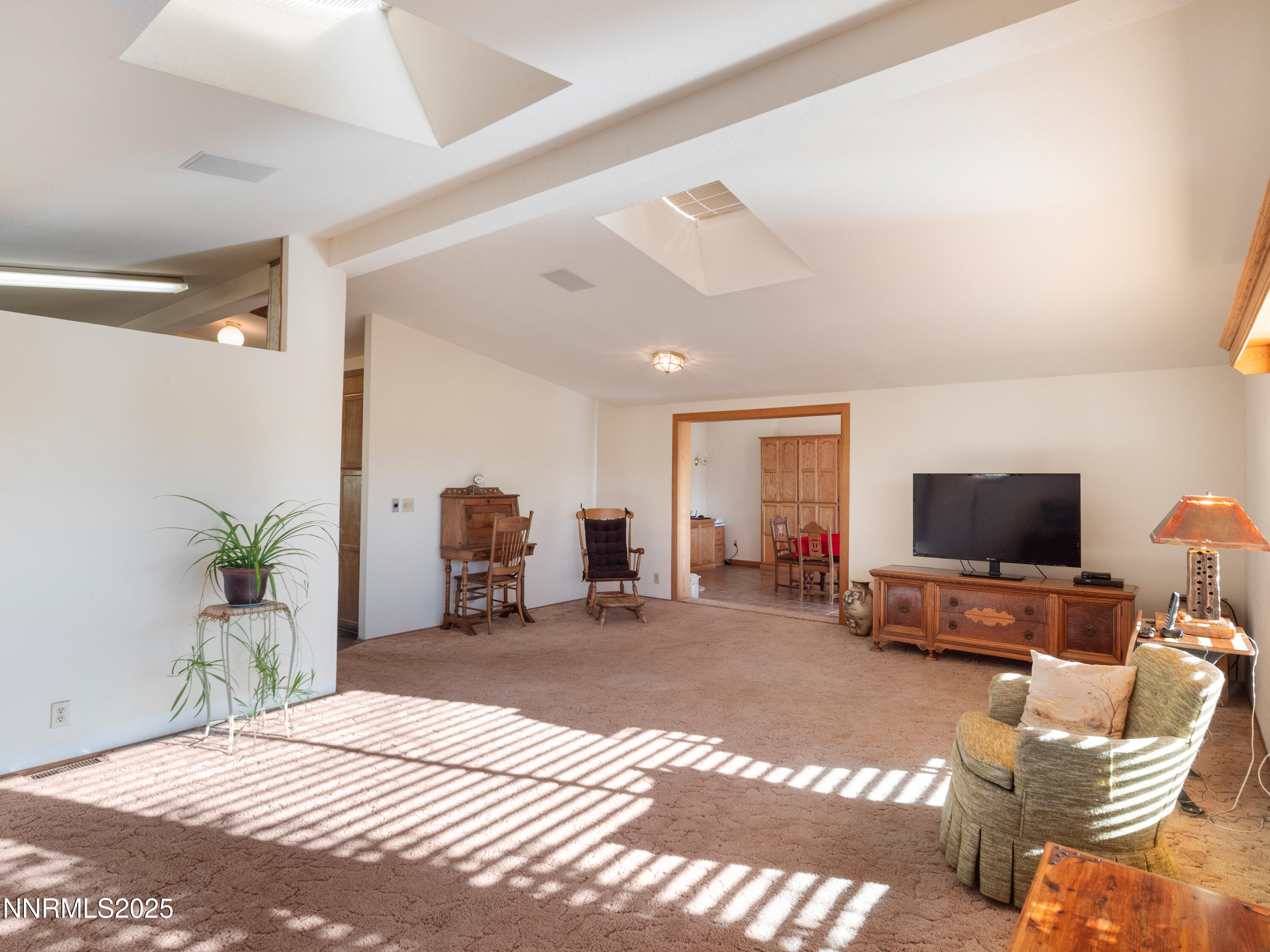 3670 Pine Nut Way Topaz Ranch Estates, NV 89444 - Photo 6 of 74 a bedroom with furniture and a flat screen tv
