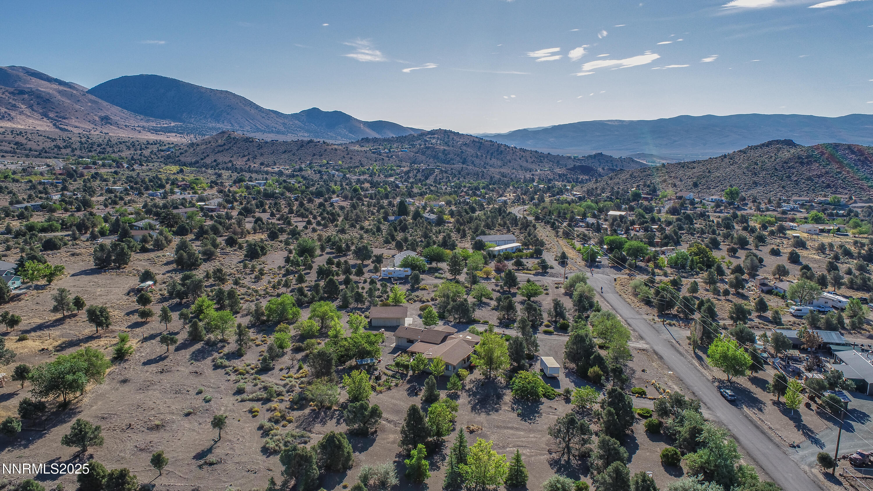 3670 Pine Nut Way Topaz Ranch Estates, NV 89444 - Photo 63 of 74 a view of a lush green hillside and houses