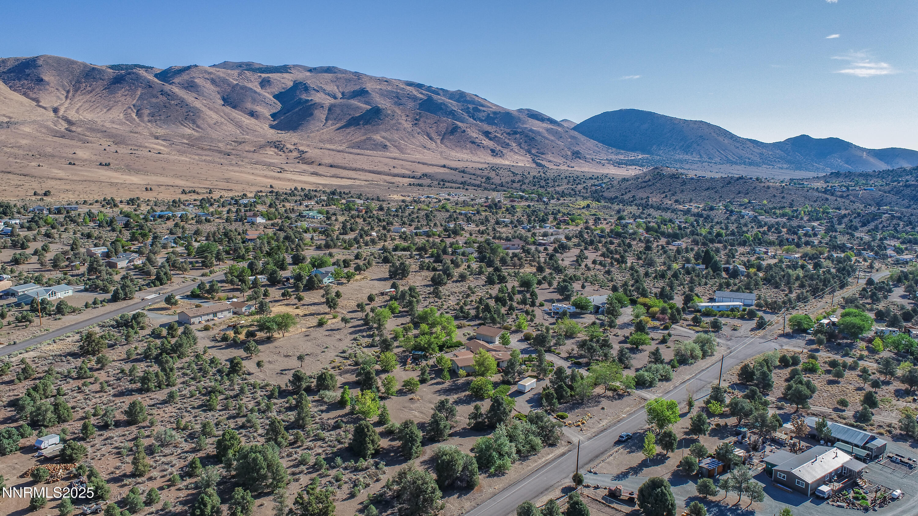3670 Pine Nut Way Topaz Ranch Estates, NV 89444 - Photo 69 of 74 a view of a large mountain with a mountain in the background