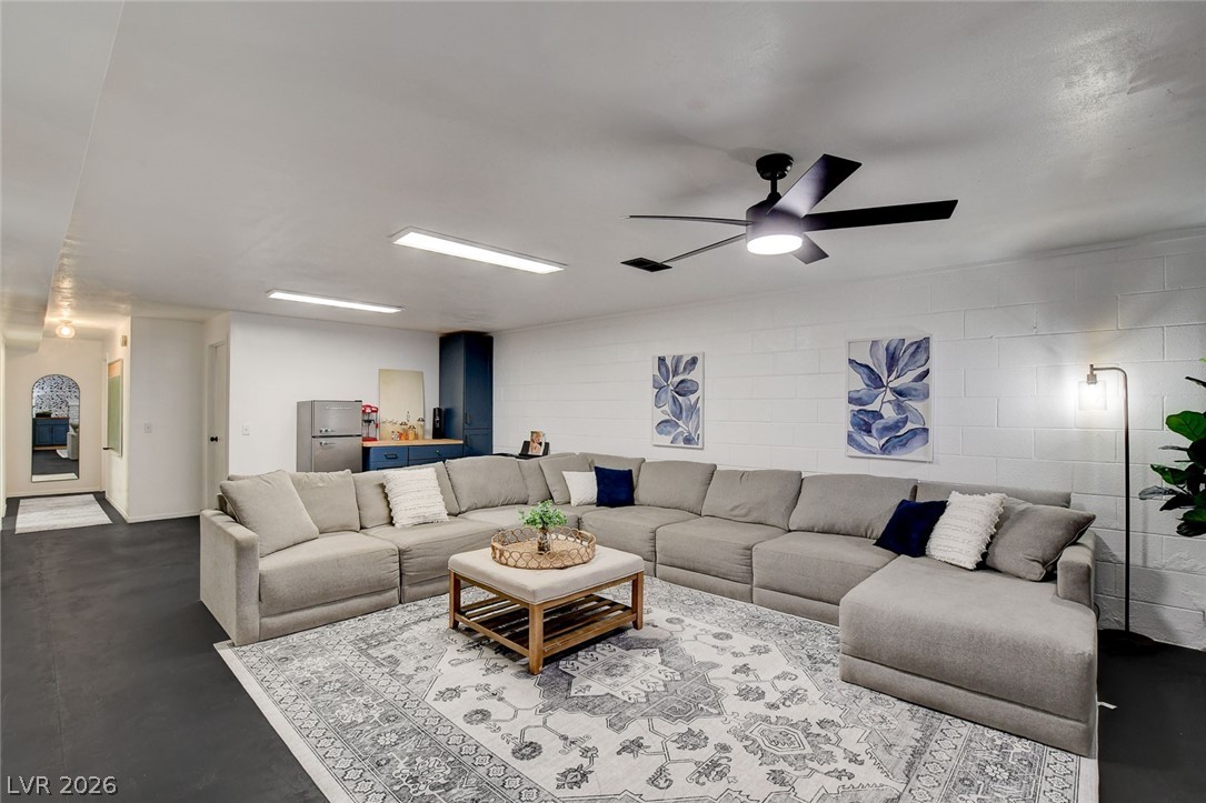 3765 Berkeley Street Logandale, NV 89021 - Photo 51 of 87 This spacious living area offers comfortable lounging and modern amenities, perfect for relaxation and entertainment.