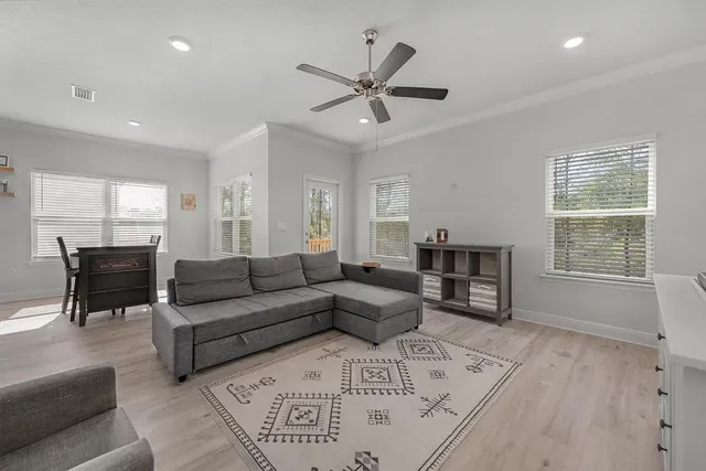 a bathroom with a tub shower and vanity