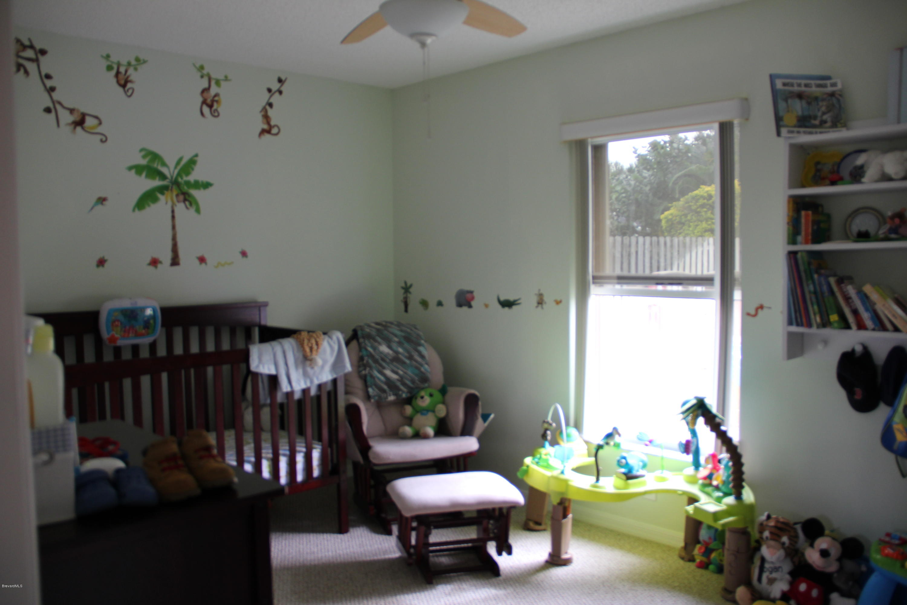 267 Twin Lakes Road Melbourne, FL 32901 - Photo 17 of 33 a living room with furniture