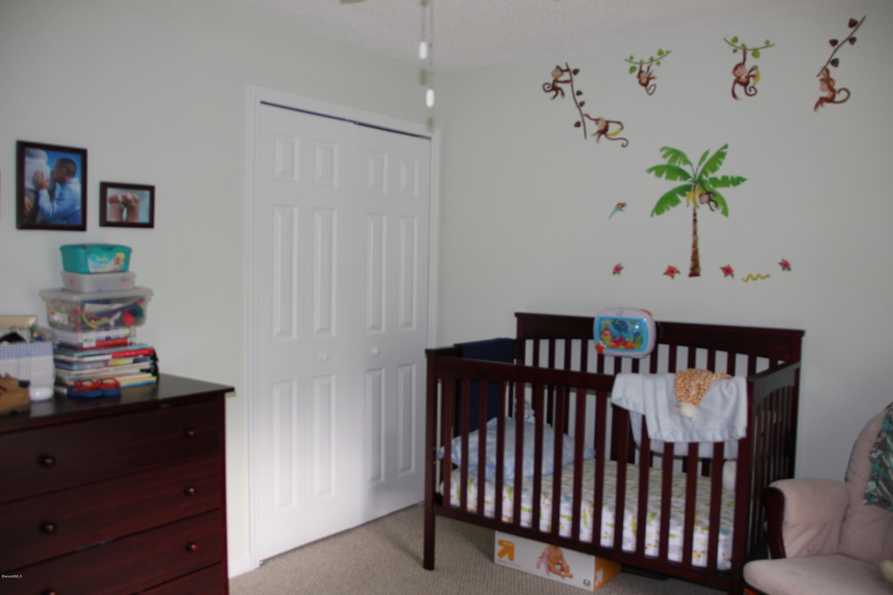 267 Twin Lakes Road Melbourne, FL 32901 - Photo 18 of 33 a view of a hallway with toys