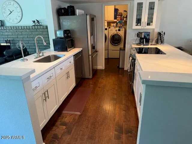 a large bed sitting in a bedroom next to a window